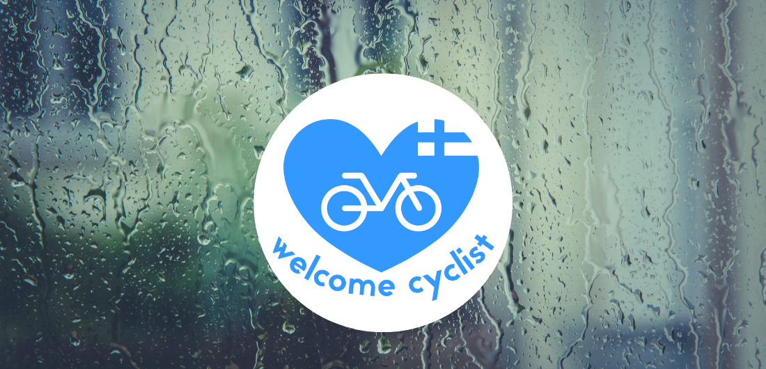 Welcome cyclist -tunnus ikkunassa